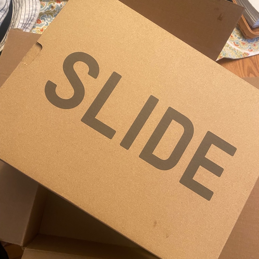 Adidas Yeezy slides in color Onyx